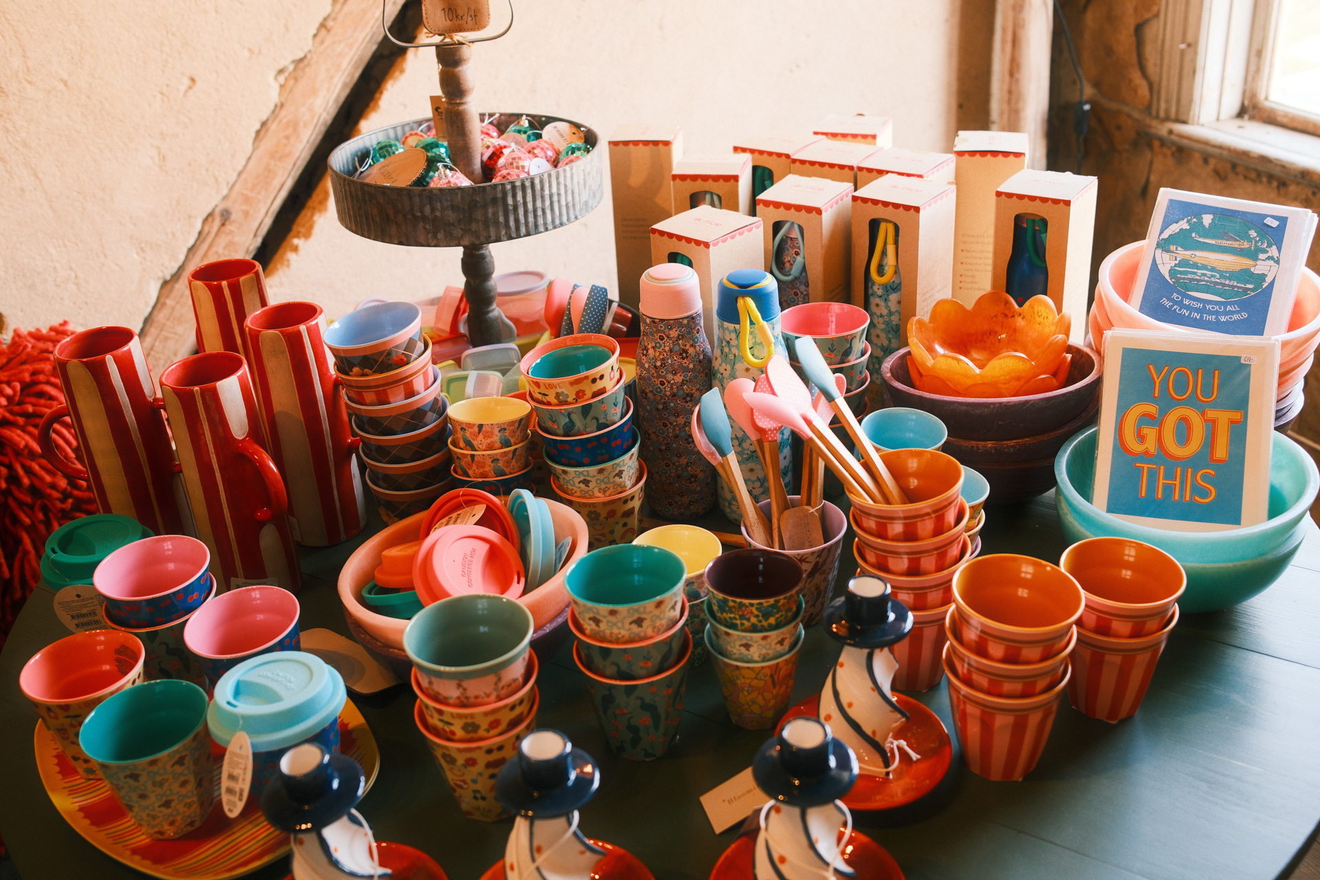 Table with colorful cups and stuff